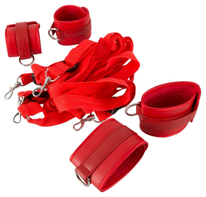 Bad Kitty Bettfessel-Set aus Lederimitat in Rot mit Riemenkreuz